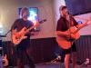 Bourbon Street on the beach owner is not only a terrific chef but musically talented as well; here singing with Rusty. golden photo